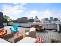 Spacious rooftop deck with city views, perfect for outdoor entertaining at 2589 Arapahoe St, Denver, CO 80205