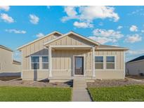Charming single story home with front porch at 2985 Oxley St, Strasburg, CO 80136