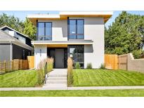 Modern two-story home with clean lines and landscaping at 4107 Bryant St, Denver, CO 80211