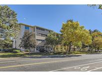 Exterior view of a three story apartment building at 3184 S Heather Gardens Way # 302, Aurora, CO 80014