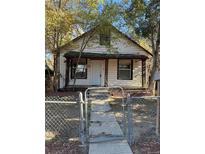 Charming one-story home with a fenced yard and walkway at 1964 Galena St, Aurora, CO 80010