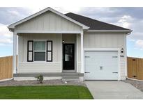Charming house with white siding and black accents at 944 Savona Ave, Fort Lupton, CO 80621