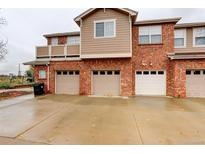 Three-car garage with attached driveway at 8865 Federal Blvd # 201, Denver, CO 80260