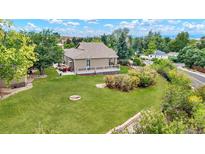 Aerial view showcasing the house, backyard, and surrounding area at 5410 Columbine Rd, Denver, CO 80221