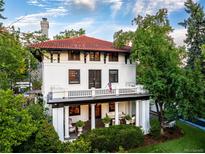 Large two story home with a balcony at 110 N Franklin St, Denver, CO 80218