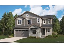 Two-story house with gray siding and stone accents at 25021 E 38Th Ave, Aurora, CO 80019