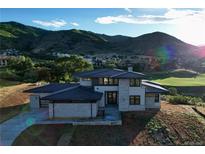 Luxury home with mountain and golf course views at 8071 Paradiso Ct, Littleton, CO 80125