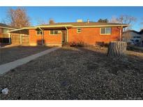 Brick ranch home with carport and landscaping at 7458 Canosa Ct, Westminster, CO 80030