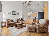 Spacious living room with hardwood floors at 1555 California St # 316, Denver, CO 80202