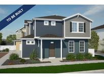To-be-built two-story home with dark gray siding and landscaping at , Aurora, CO 80019