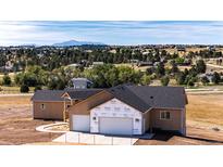 New construction home with mountain views and large lot at 37057 Still Rock, Elizabeth, CO 80107