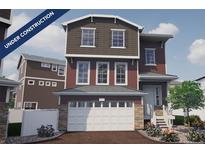 Two-story home with a two-car garage and landscaping at 1230 Sugarloaf Ln, Erie, CO 80516