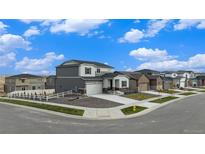 New homes and streets in a residential development with a corner lot at 18235 Caffey Dr, Parker, CO 80134