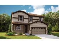 Two-story house with a beige exterior, brown accents, and a two-car garage at 1382 Rock Cliff Ave, Erie, CO 80516