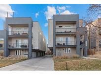 Modern three-story townhouses with balconies and private driveways at 1625 King St # 4, Denver, CO 80204