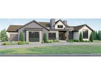 Two-story home with stone and shingle exterior, landscaping, and a paved driveway at 6178 Oxford Peak Ln, Castle Rock, CO 80108