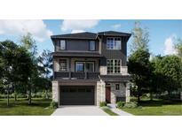 Stunning two-story home with a modern design and attached garage at 6717 E 149Th Ave, Thornton, CO 80602