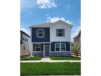 Two-story home with navy and white exterior at 28468 E 8Th Pl, Watkins, CO 80137