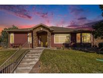 Stunning ranch home with a welcoming front entrance at 8547 Gold Peak Dr # G, Highlands Ranch, CO 80130