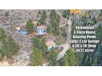 Remodeled 3-story house, amazing views, solar, 2-car garage, shop on 27 acres at 420 Chinook Rd, Idaho Springs, CO 80452