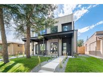 Modern two-story home with a landscaped front yard at 4121 Kalamath St, Denver, CO 80211