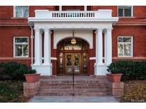 Elegant building entrance with ornate details and double doors at 836 E 17Th Ave # 2E, Denver, CO 80218