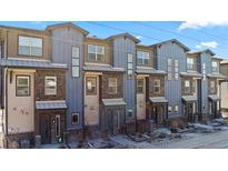 Exterior view of a row of townhouses at 1025 S Gilbert St # C, Castle Rock, CO 80104