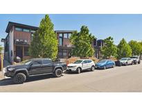 Modern townhouses with parking in front at 2466 S Delaware St # 2, Denver, CO 80223