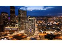 Night aerial view of high rise building in city at 2001 Lincoln St # 3223, Denver, CO 80202