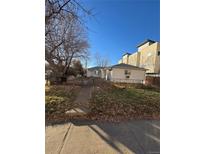 Duplex home with yard and gated entry at 3577 S Pennsylvania St, Englewood, CO 80113
