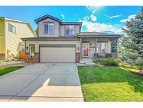 Two-story house with a two car garage and nice lawn at 5359 Military Trl, Parker, CO 80134