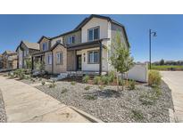 Charming two-story home with a landscaped front yard at 1250 S Algonquian St, Aurora, CO 80018