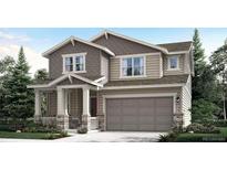 Two-story house with gray siding, stone accents, and a two-car garage at 290 Paloma Way, Elizabeth, CO 80107