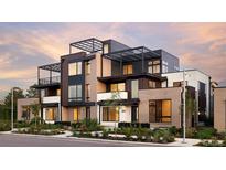 Modern multi-unit building with brick exterior, metal accents, and rooftop decks at 6920 E Lowry Blvd # F1P9, Denver, CO 80230