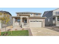 Two-story home with stone and siding accents at 1029 Sunrise Dr, Erie, CO 80516