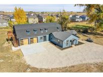 Aerial view of house and property at 14405 County Road 12, Fort Lupton, CO 80621