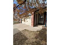Two-car attached garage with driveway at 5941 S Quail Way, Littleton, CO 80127