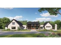 Modern farmhouse style home with stone accents at 8830 Witez Ct, Parker, CO 80134