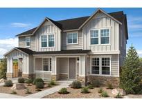 Two-story home with modern farmhouse exterior at 13568 E 111Th Ave, Commerce City, CO 80022