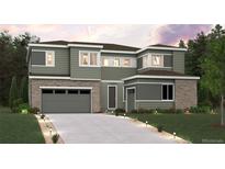 Two-story home with gray siding, stone accents, and a three-car garage at 2561 Lupton Ln, Lafayette, CO 80026