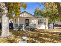 House exterior showcasing a charming curb appeal at 6005 E Iowa Ave, Denver, CO 80224