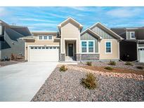 Two-story home with neutral siding and landscaping at 15754 Little Bluestem Rd, Monument, CO 80132