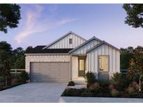 Modern farmhouse style home with gray garage door and brick accents at 8912 Whiteclover St, Littleton, CO 80125