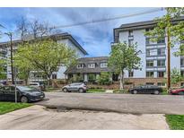 Modern condo building with ample parking and landscaping at 555 E 10Th Ave # 3, Denver, CO 80203