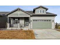 Beautiful two-story home with a large front yard and attached garage at 3051 Newfound Lake Rd, Berthoud, CO 80513