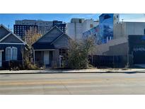 Small house for sale with street view in urban setting at 3742 Brighton Blvd, Denver, CO 80216