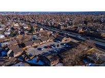 Aerial view of multi-unit property near highway, ample parking at 4625 W 6Th Ave # 10, Denver, CO 80204