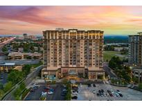 Luxury high-rise building with adjacent shops and parking at 7600 Landmark Way # 1215, Greenwood Village, CO 80111