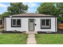 Newly renovated home with fresh paint and landscaping at 1441 Verbena St, Denver, CO 80220