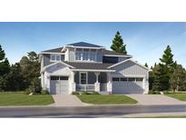 Two-story house with gray siding and three-car garage at 1243 Sunrise Dr, Erie, CO 80516